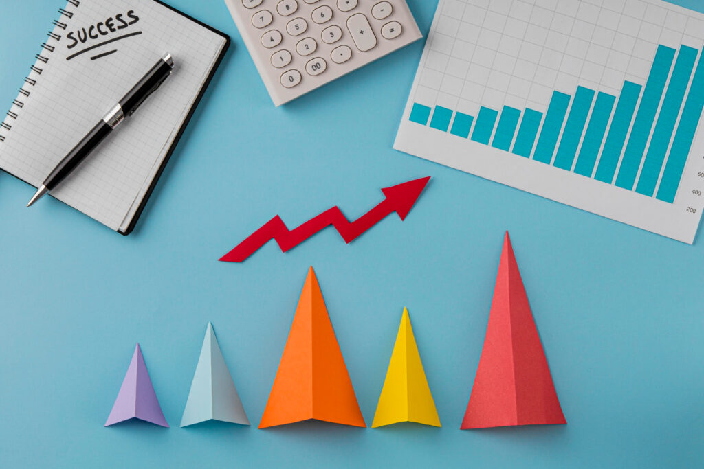 Trending line, calculator and graph showing ROI concept.