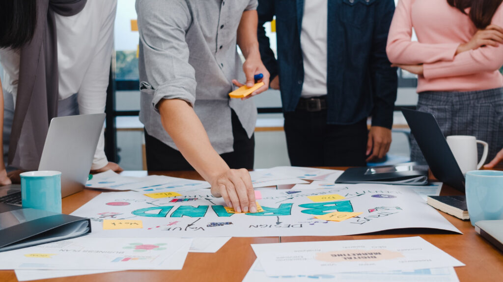 People devising marketing and branding strategies
